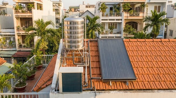 Insulated hot water storage tank in plant room