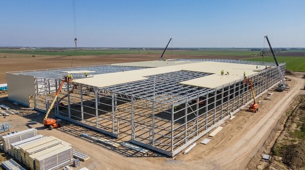 Industrial warehouse with insulated roof panel system